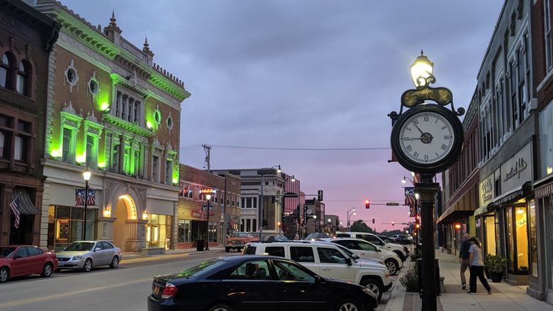 Washington Avenue in Iowa Falls, Iowa at dusk with antique standing clock