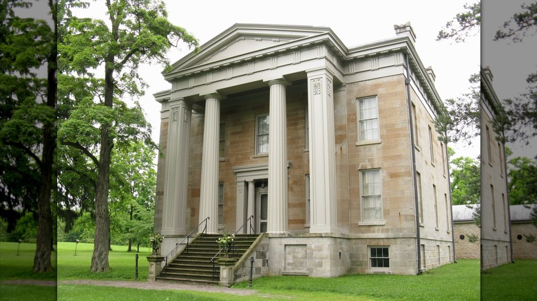 One of the two-story historic buildings of Ruthven Park Historic Site, featuring tall pillars of the Greek Revival style