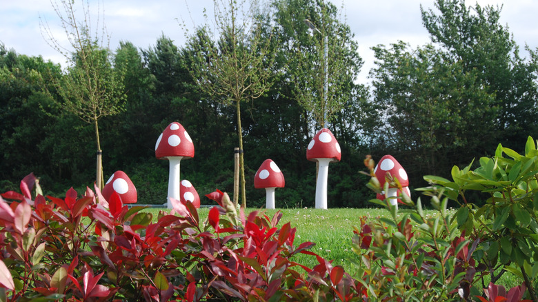 Bright red mushroom sculptures in Glenrothes Riverside Park, Scotland