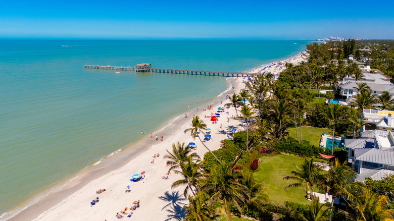 aerial view over Naples Pier and beach in Florida