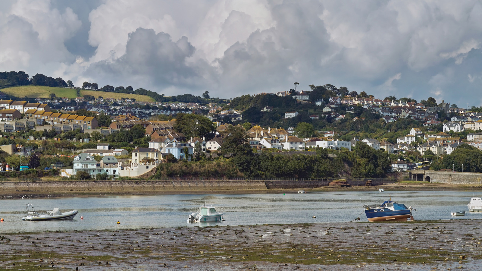 Between Exmouth And Torquay Is A Vibrant Coastal Town With Fresh Seafood, Quaint Shops, And Beaches