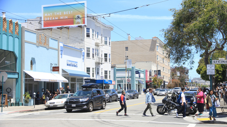 People walk on a summer day in Marina District in San Francisco