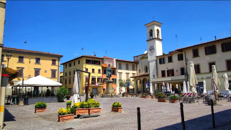 The Piazza Giotto with a statue of Giotto in Vicchio, Florence, Italy