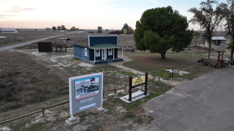 This is a picture of the entry sign and building at Colonel Allensworth State Historic Park in California's Central Valley