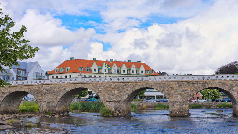 The Tullbron Bridge with its arches above the river and historic buildings behind