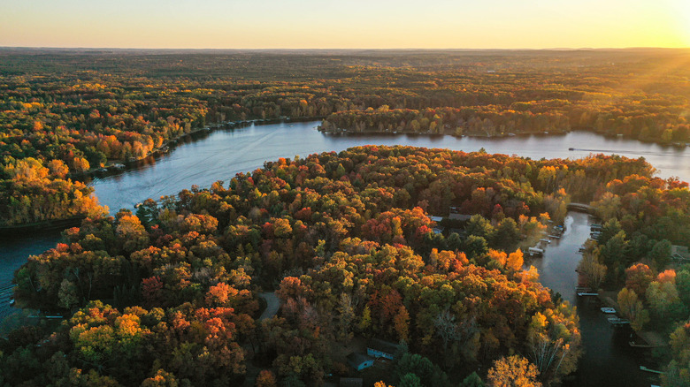 An aerial view of a forested landscape during sunset in Keshena, Wisconsin.
