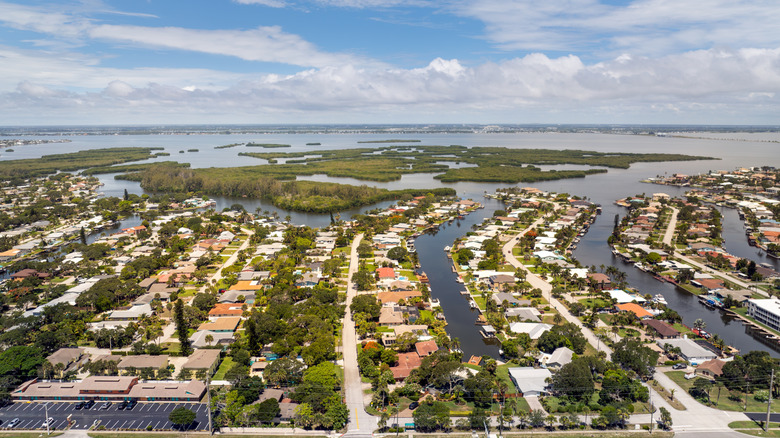 Aerial views of Cocoa, a city in Brevard County. The neighborhood is surrounded by canals and wetlands.
