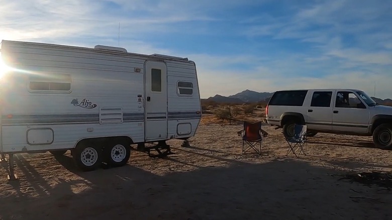 A camper and SUV in the Sheephole Valley Wilderness