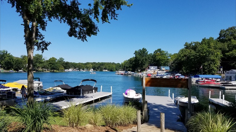 Wooden docks and moored boats on a sunny day at Gull Lake Marine Bayside, Gull Lake, Michigan