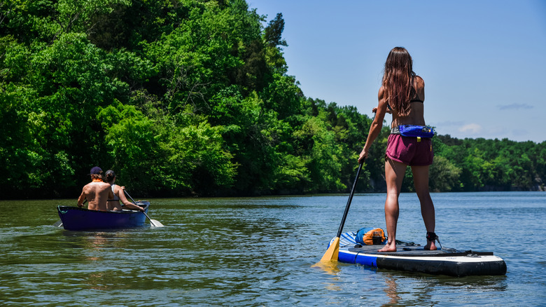 Two people paddleboarding