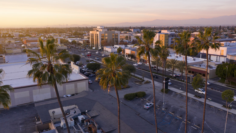 An aerial sunset view over downtown Downey, California