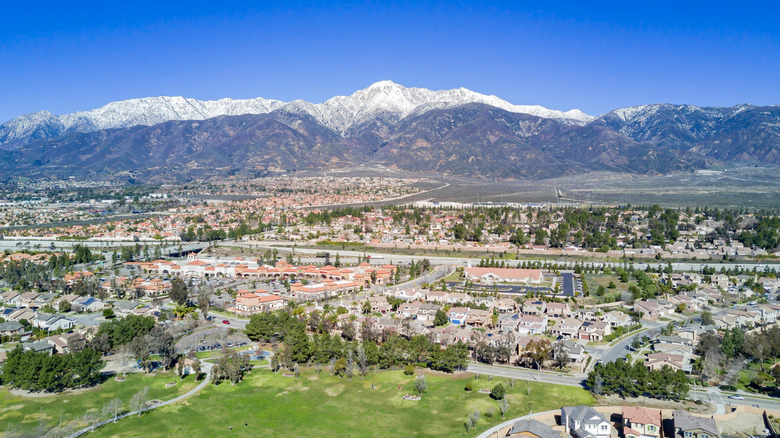An aerial view of Rancho Cucamonga with the San Gabriel Mountains in the background