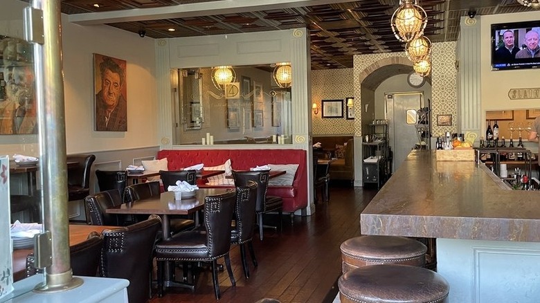 Stamped metal ceilings, pendant lighting, and banquet sofas elevate the atmosphere at Dublin 4 Gastropub in Mission Viejo, California