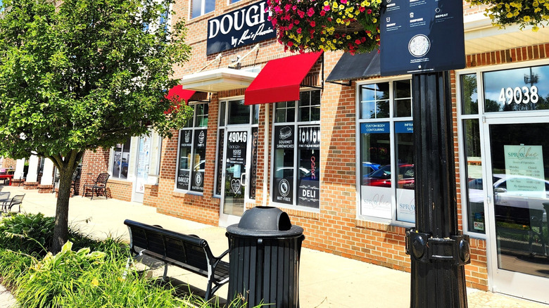 businesses along sidewalk in Wixom Michigan