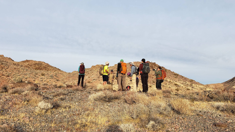 A group of prepared hikers gathering in the Nopah Range Wilderness