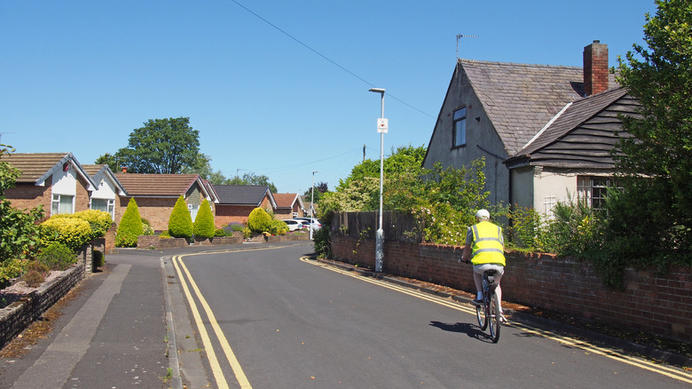 Street lined with brick homes in Formby, England