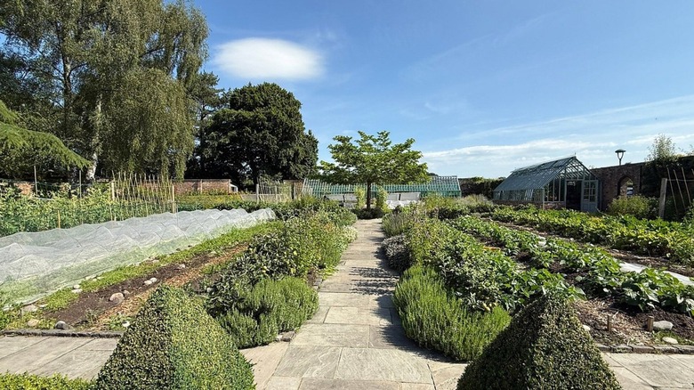 Green gardens of Moor Hall in Ormskirk, U.K., a historic, Michelin-starred restaurant