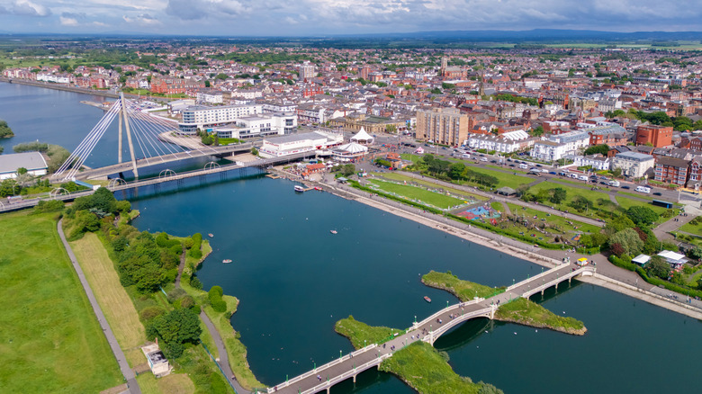 Aerial view of Southport, England, with bridges over Marine Lake with gassy fields