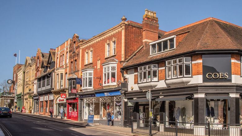 Shops lining the road along High Street in Maldon, England on a bright, clear day