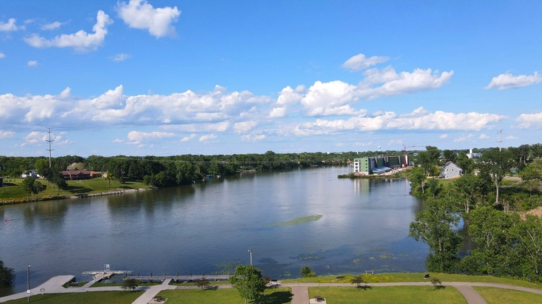 An aerial photo on a sunny summer day overlooking Sunset Park in Kimberly with the Fox River and green trees
