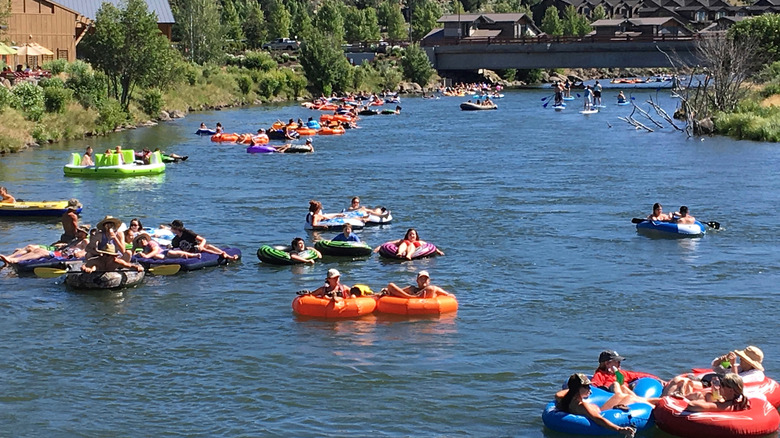 People tubing down the river