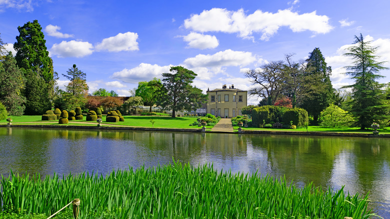 Water surrounded by trees in Thorpe Perrow Arboretum, Bedale, North Yorkshire, U.K.