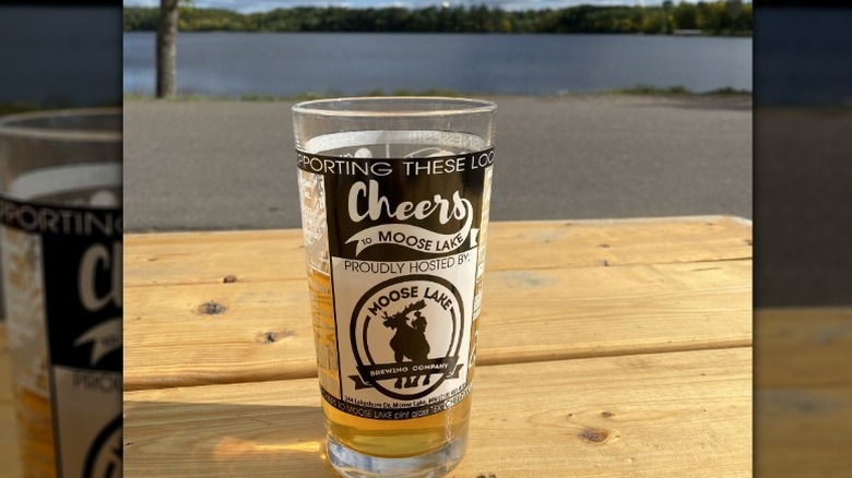 A beer overlooking the lake at Moose Lake Brewing Company