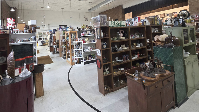 Rows of shelves full of antiques at Hixton House Antique Mall