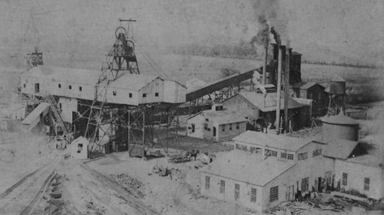 Old photo of the coal mine at Cardiff, a black-and-white image of early 20th century industrial buildings