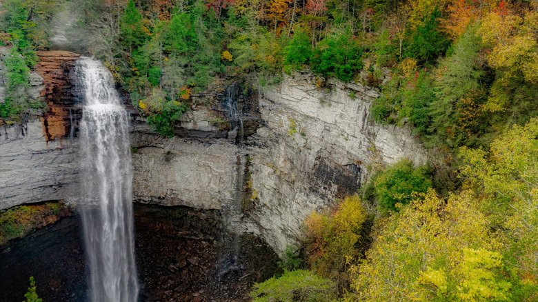 A huge waterfall crashes off a cliff in the forests of Upper Cumberland