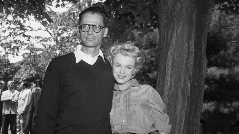 Late Roxbury residents Marilyn Monroe and Arthur Miller stand in front of a tree