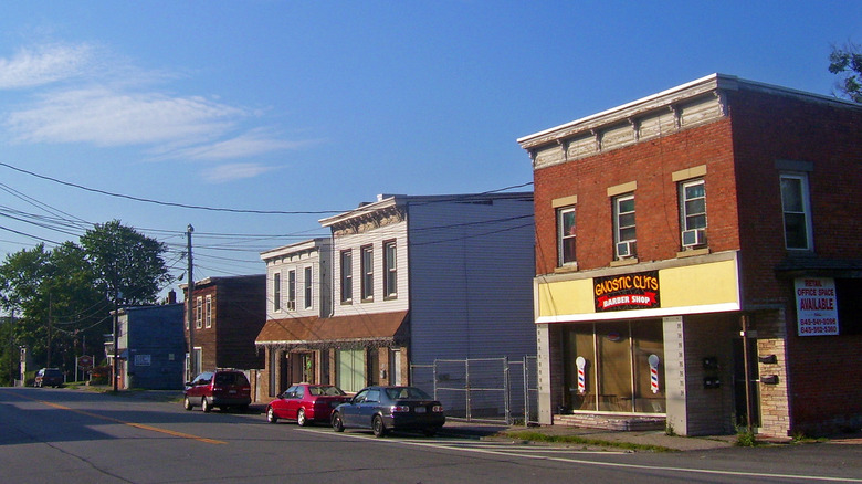 Several charming buildings line a quiet street in downtown New Windsor, New York.