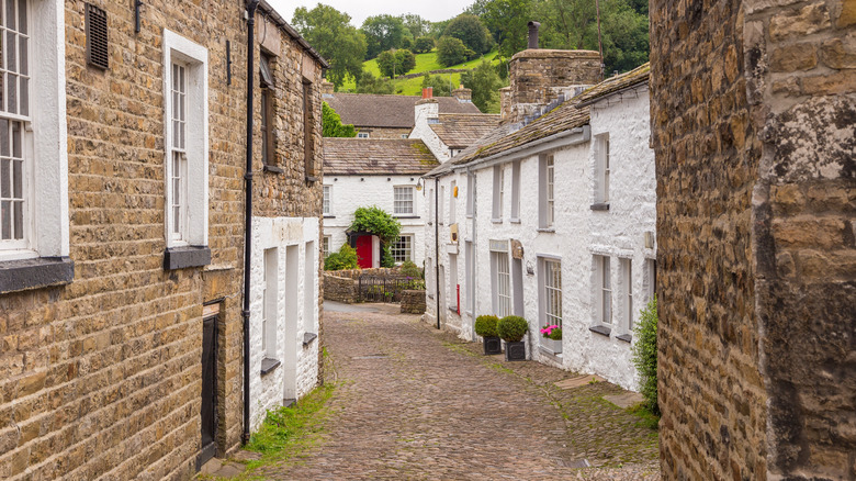 The cobblestone lane through Dent, England, surrounded by cottages