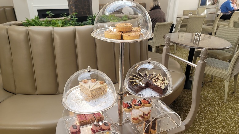 Afternoon tea display with cakes and savory tarts at Bettys Café Tea Rooms