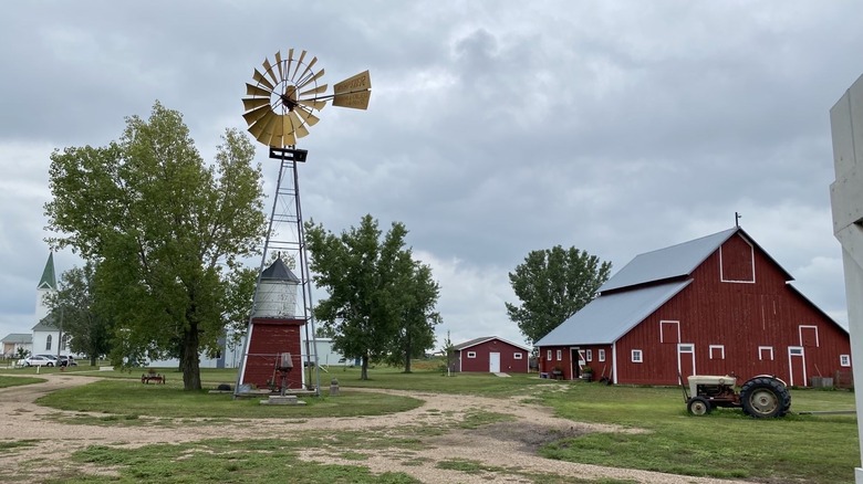 The red barn and windmill at the Wessels Living History Farm in York, Nebraska
