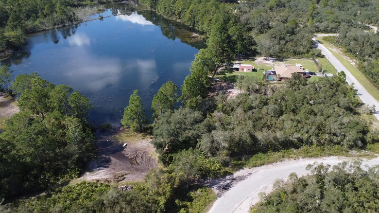 Aerial view of Silver Springs Shores, with a home next to the water