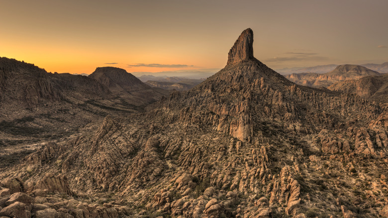 Weaver's Needle rock formation at sunset Peralta Trail Arizona