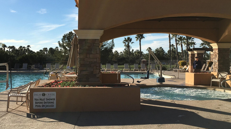 View of swimming pool area in Palm Creek RV Resort, Arizona