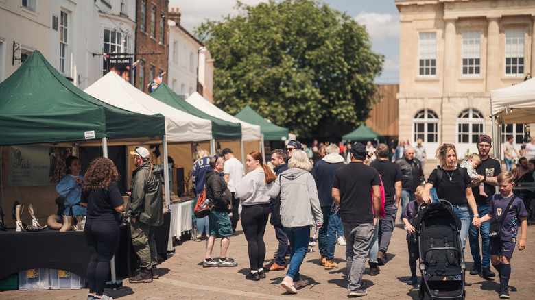 Crowds visiting the market stalls on High Street in Andover, U.K.