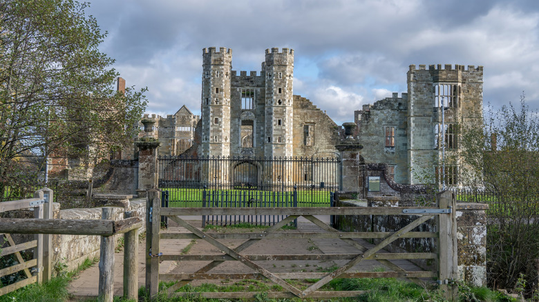 The two crenellated towers of the Cowdray House ruins in Midhurst, England
