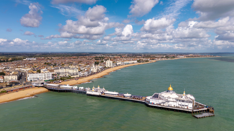 Coastline of Eastbourne with Eastbourne Pier on a sunny day