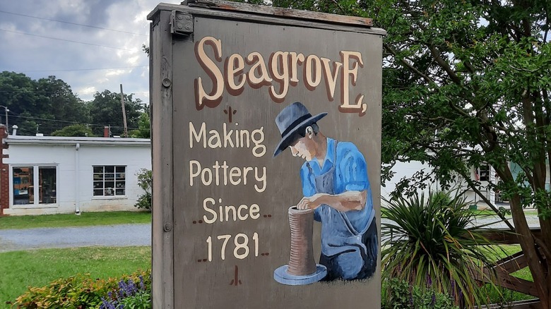 Painted sign outside that says Seagrove making pottery since 1781