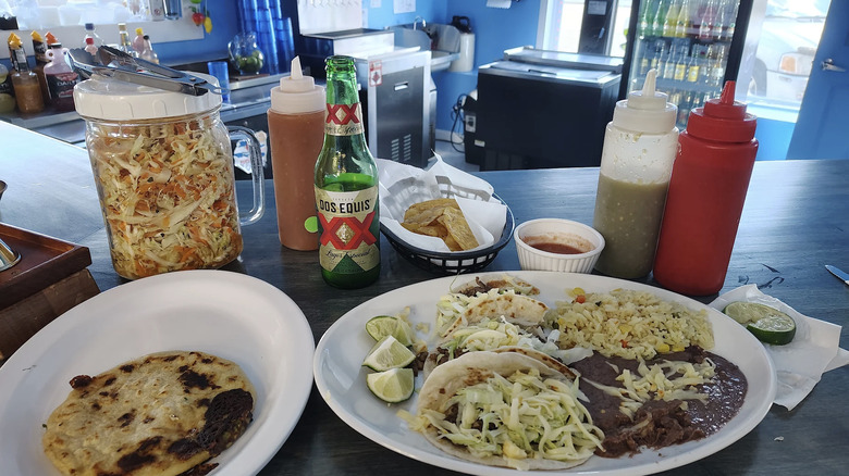 Meal at Pupuseria El Ecanto blue walls in background