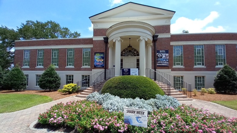 The exterior of the Georgia Southern Museum, located at Georgia Southern University, with a floral entrance