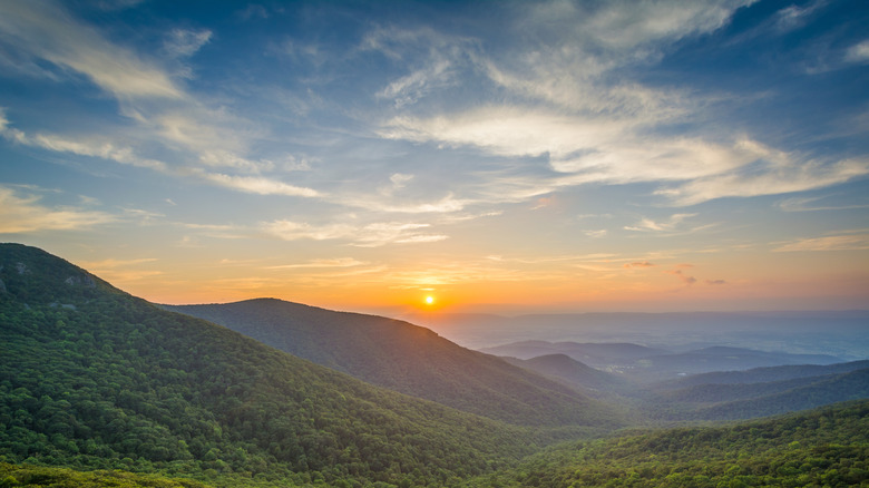 Sun dipping over the Shenandoah Valley by the Blue Ridge Mountains in Virginia