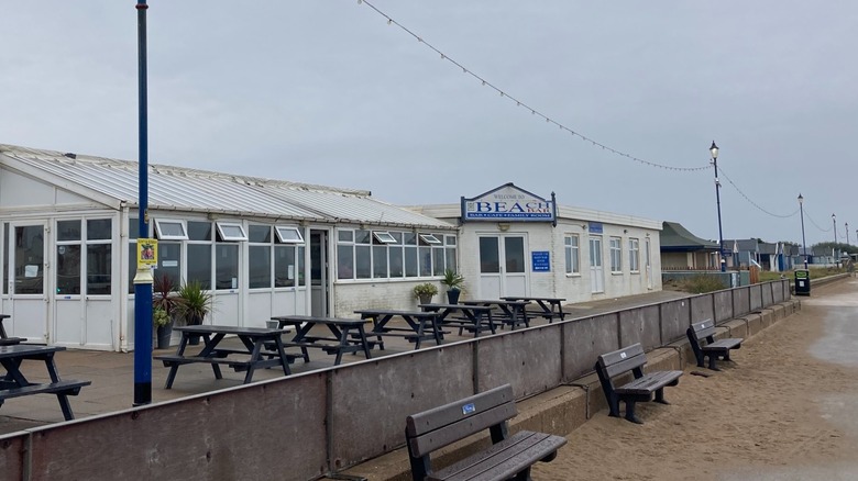 Exterior and outdoor seating of The Beach Bar at Sutton-on-Sea