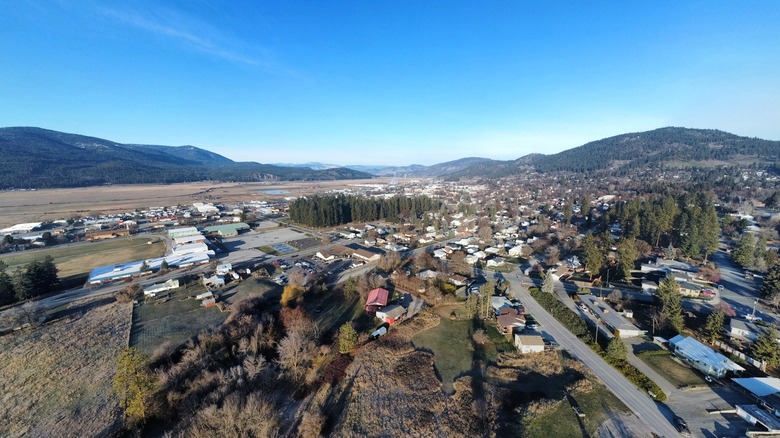 An aerial view of Colville with mountains in the distance