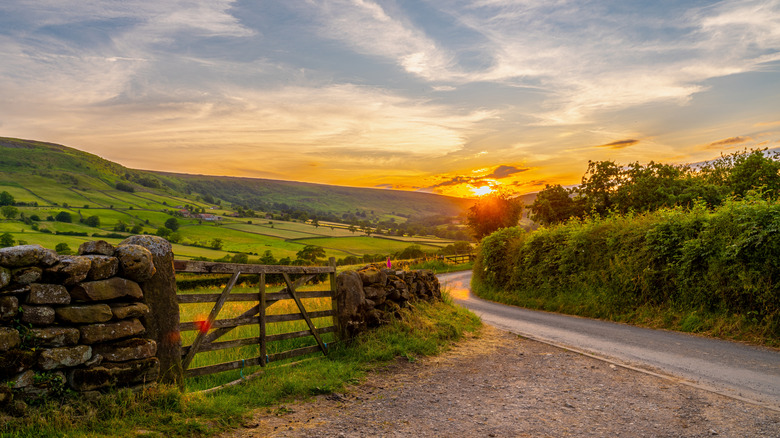 A stone fence and gate at Blakey's Ridge in the North York Moors at sunset