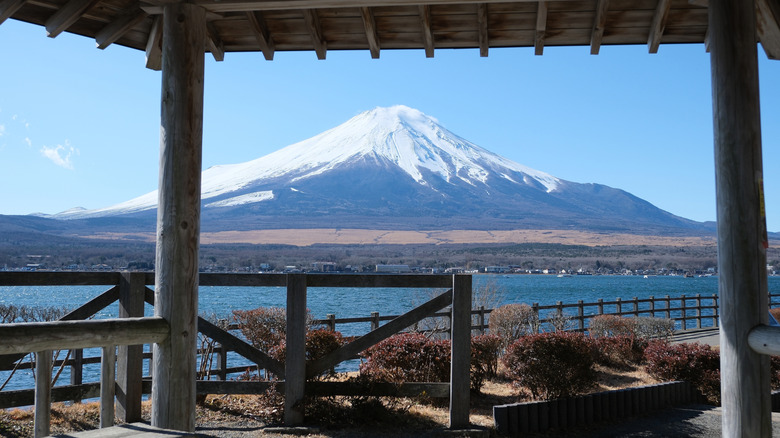 Shelter and sidewalk at Lake Yamanaka with views of Mt. Fuji.