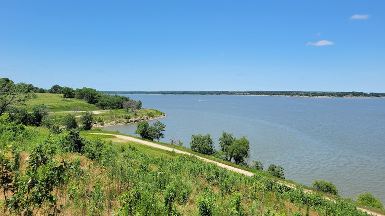 Fall River State Park, Kansas, on a sunny day, with greenery surrounding the lake